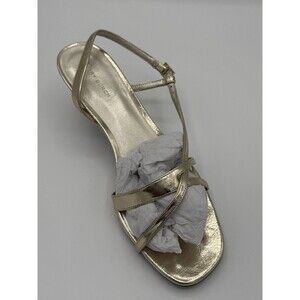 Tory Burch kitten heel in gold. Light scuffing on the sole. Size 9m  Retail $179